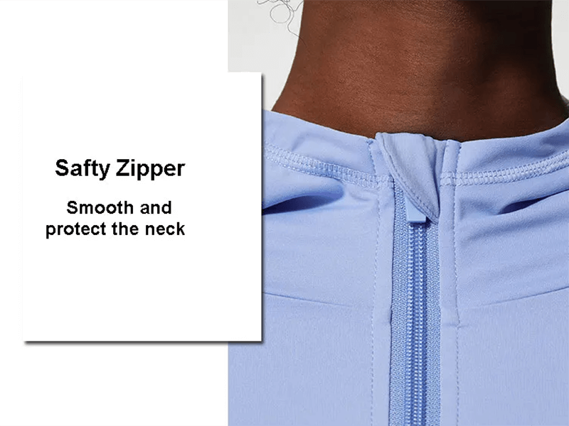 Close-up of a blue activewear top with a safety zipper designed to smooth and protect the neck, part of a versatile women's fitness set.